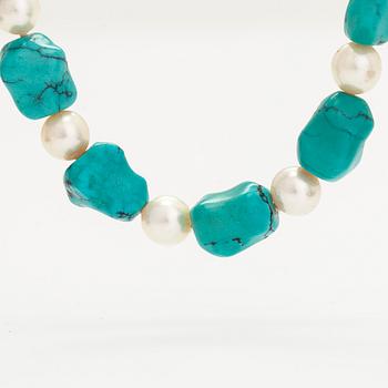 A cultured pearl and turquoise necklace.