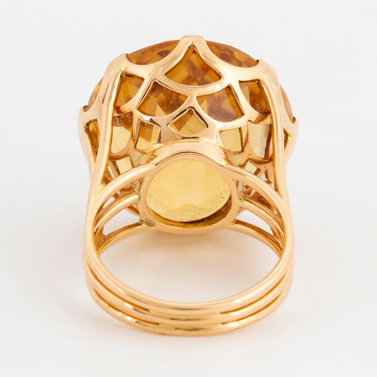 Round mixed-cut citrine cocktail ring.