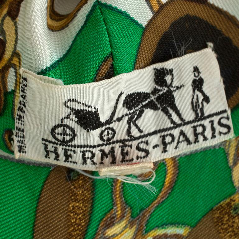 HERMÈS, a green silk dress from the 1960s.