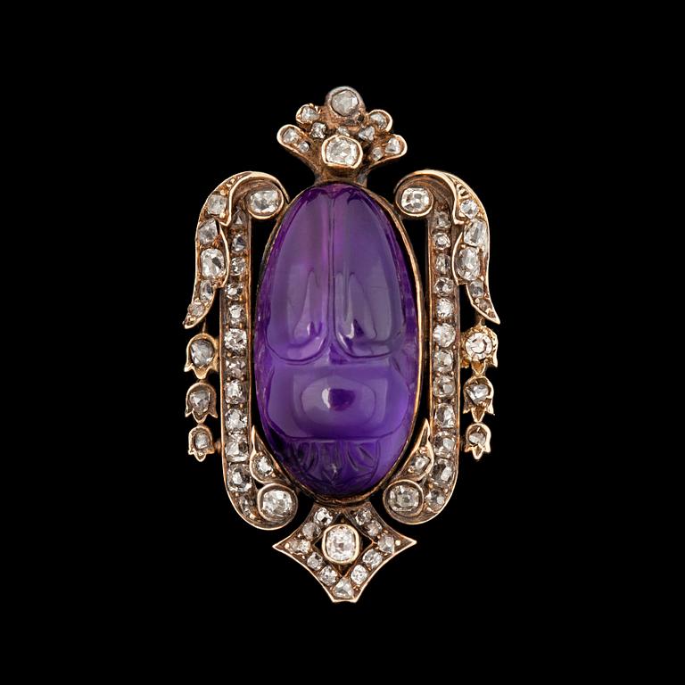 An amethyst brooch, set with old-cut diamonds tot. 0.95 ct.