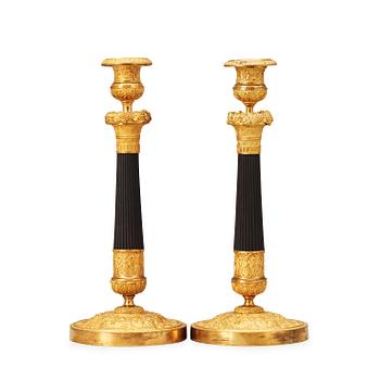 1465. A pair of French Empire 19th century candlesticks.