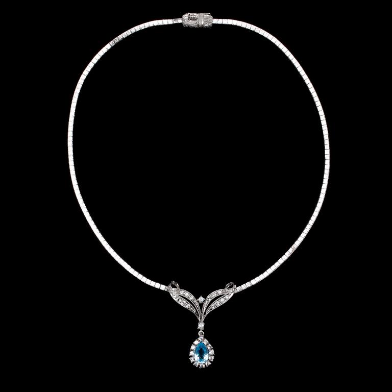 COLLIER, 9k vitguld med droppformad topas och 28 briljantslipade diamanter, tot ca 1 ct. Vikt ca 19,5 gram.