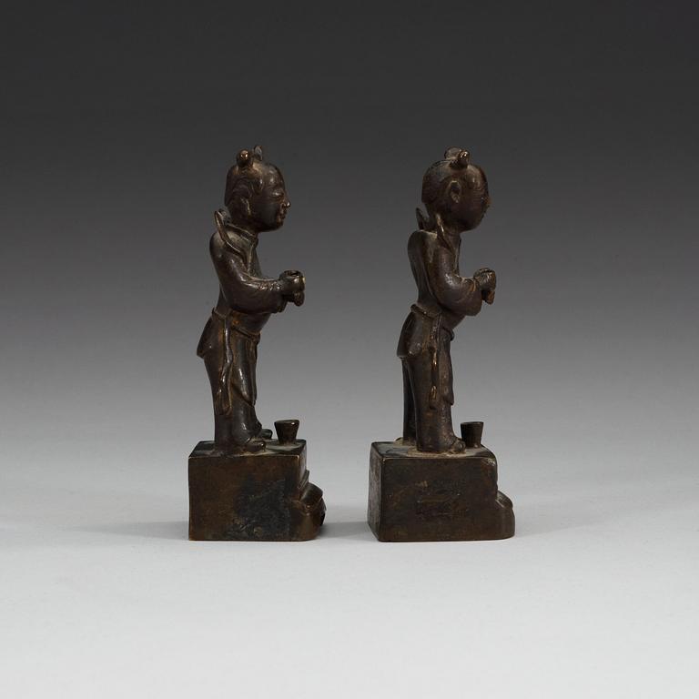 A pair of bronze joss stick holders, Qing dynasty.