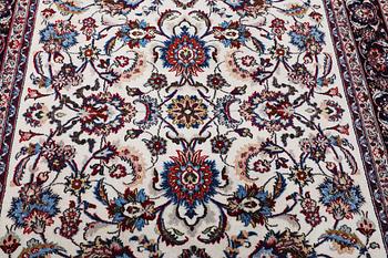 A Nain carpet, part silk, c. 294 x 201 cm.