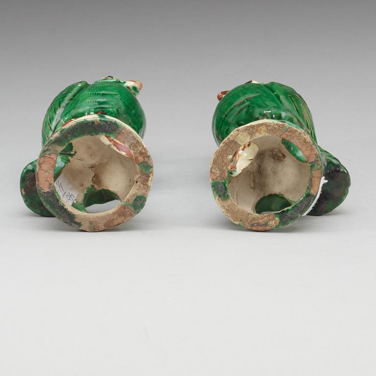 A set of two green glazed falcons, late Qing dynasty.