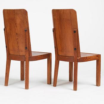 Axel Einar Hjorth, a pair of stained pine 'Lovö' chairs, Nordiska Kompaniet, Sweden 1930s.