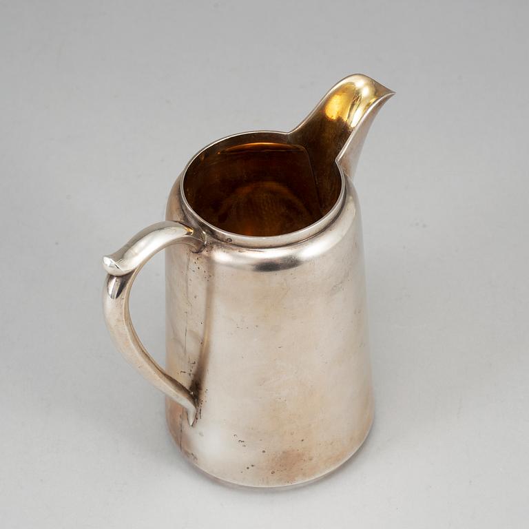 A Russian parcel-gilt silver jug, mark of Michail and Semen Grachev, St. Petersburg 1908-1917.