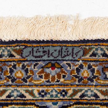 A Keshan carpet, c. 412 x 308 cm.