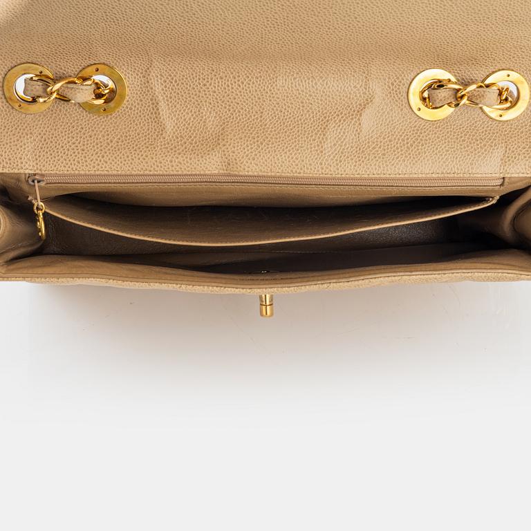 Chanel, a beige 'Caviar Jumbo Classic Flap Bag', vintage.