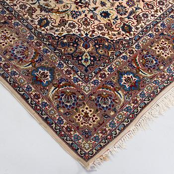 A semi-antique Isfahan rug, central Persia, signed c. 238 x 165 cm.