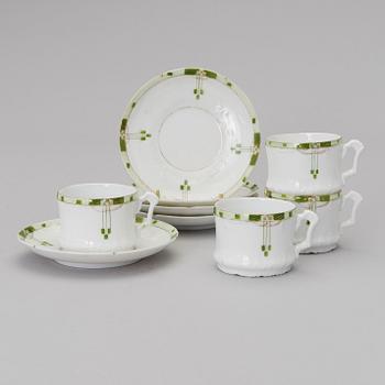 A set of four Kuznetsov porcelain coffee cups with saucers, export marked Fabrique Kousnetzoff, 1890-1913.