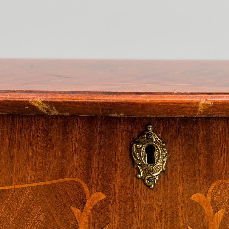 A chest of drawers, mid-20th Century.