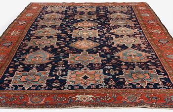 An antique Heriz carpet of karadja design, Northwest Persia (Iran), c. 338 x 239 cm.