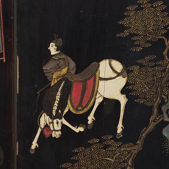 A Chinese four panel lacquer folding screen, first part of the 20th century.
