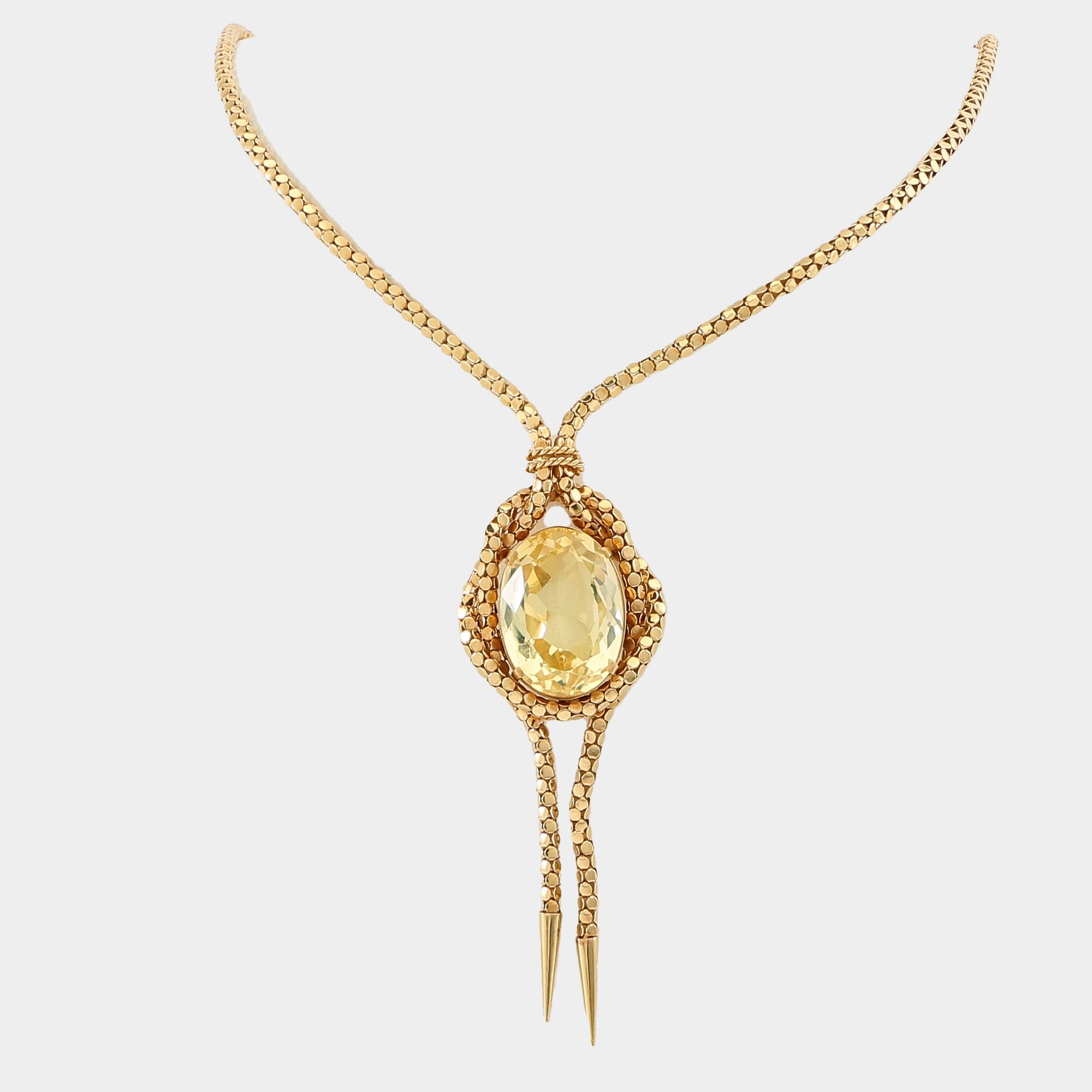Necklace 18K gold with an oval faceted green synthetic spinel.