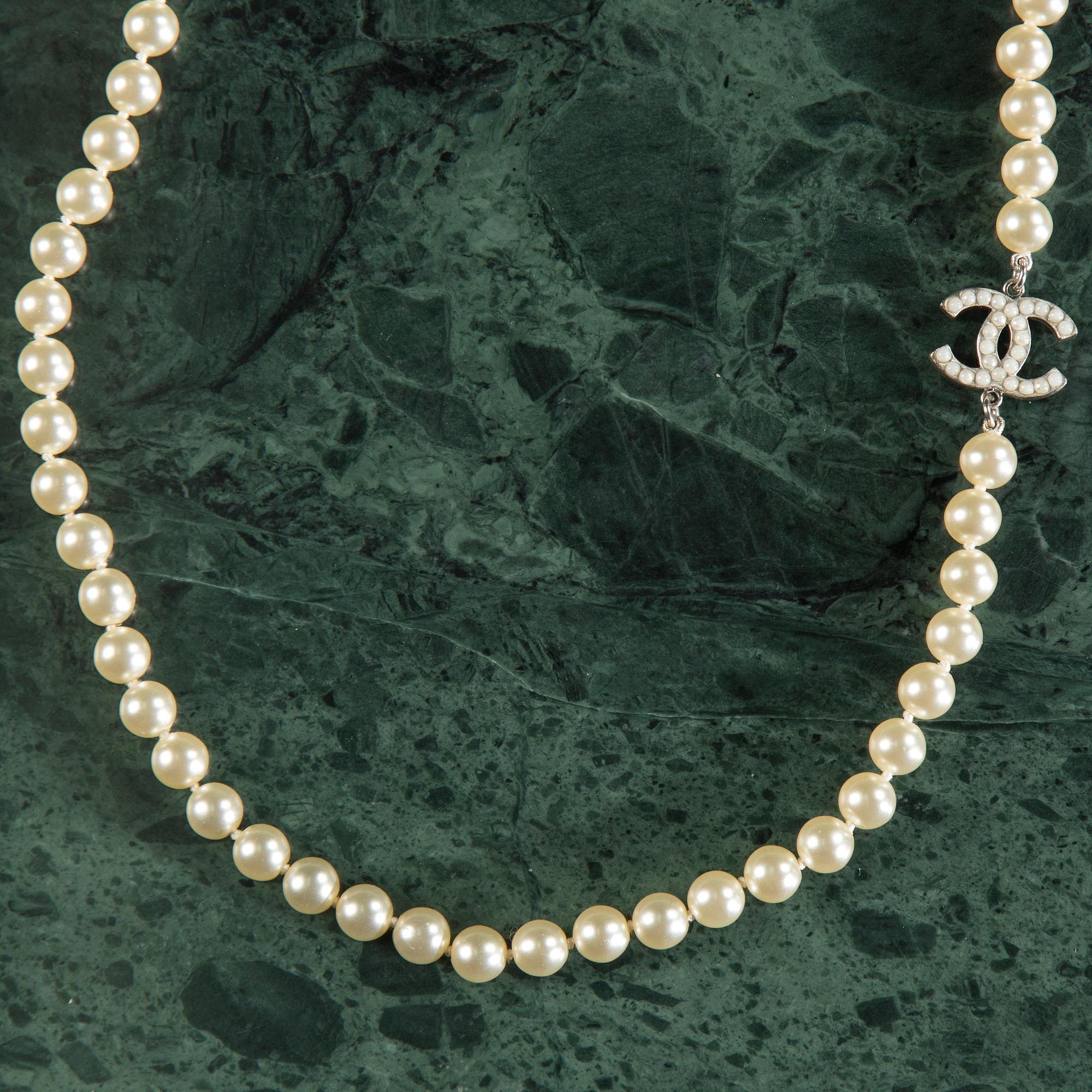 Necklace by Chanel.
