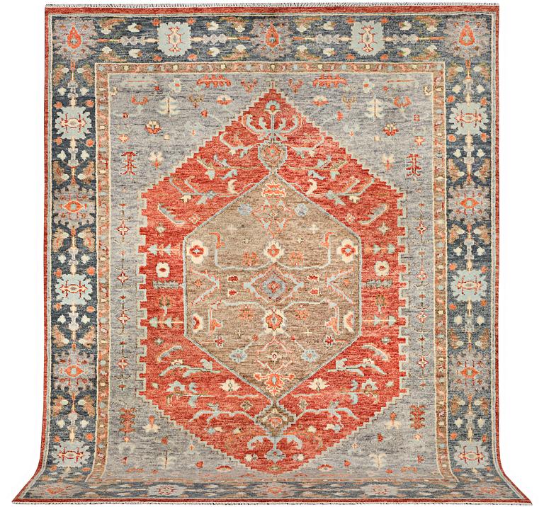 An oriental carpet with Mamluk design, c. 359 x 281 cm.