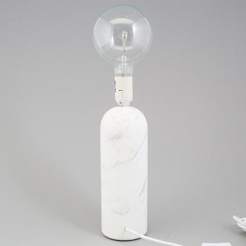 a "Kizu" table lamp by Lars Tornoe for New works.