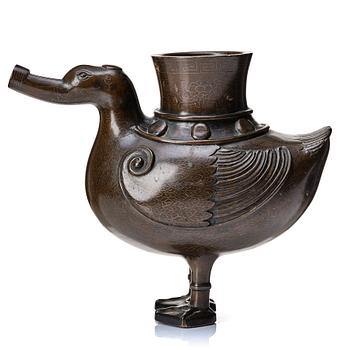 866. A bronze archaistic duck shaped vessel with silver inlay, Qing dynasty (1644-1912).