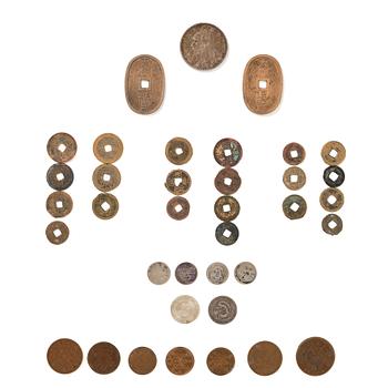 980. En grupp kinesiska mynt, silver och koppar. Qingdynastin samt tidigt 1900-tal.