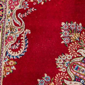 A carpet, Kirman, ca. 333 x 244 cm.