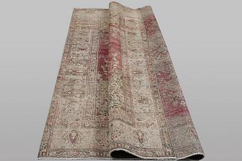 An oriental vintage design carpet, c. 335 x 240 cm.