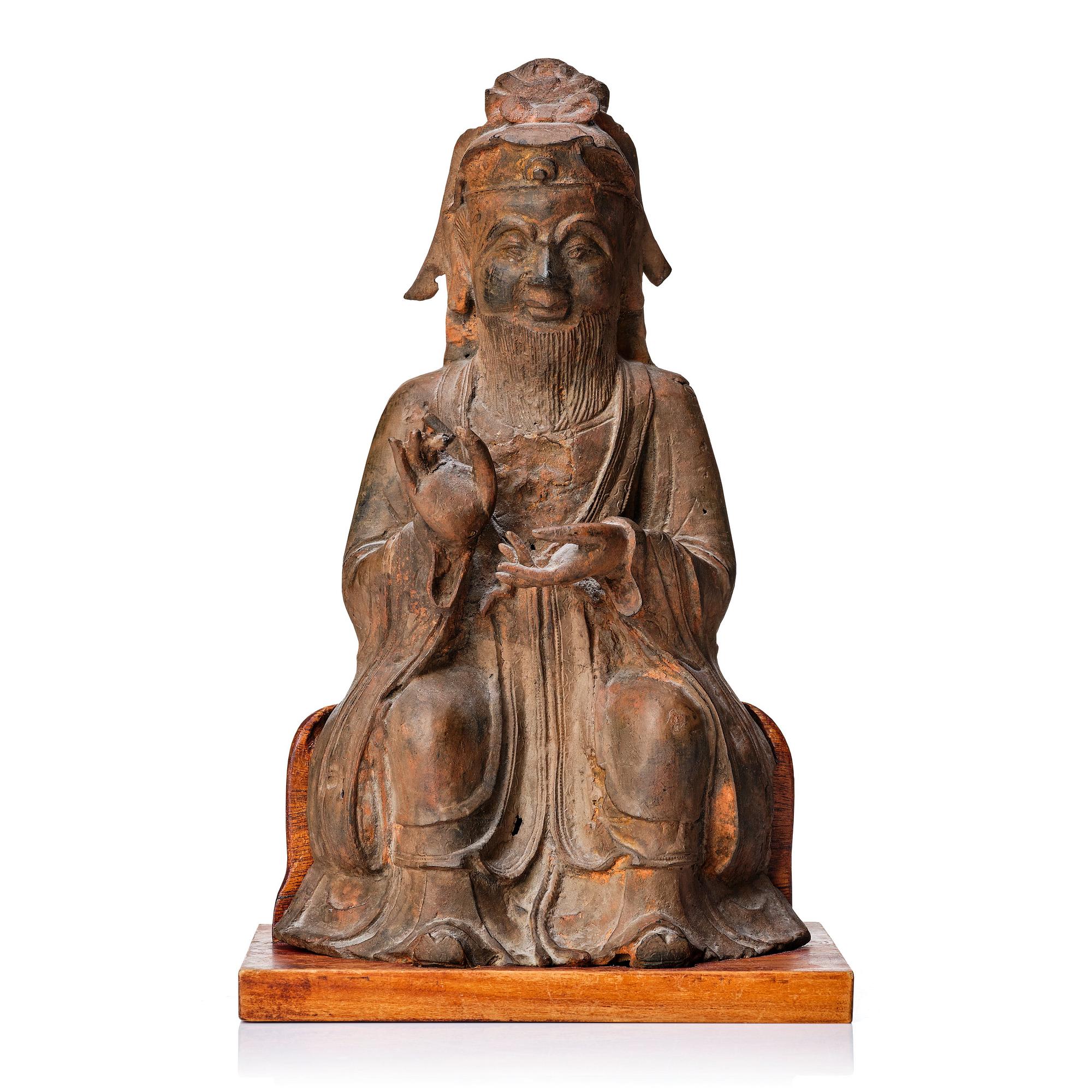 A bronze sculpture of a daoist deity, Ming dynasty (1368-1644).
