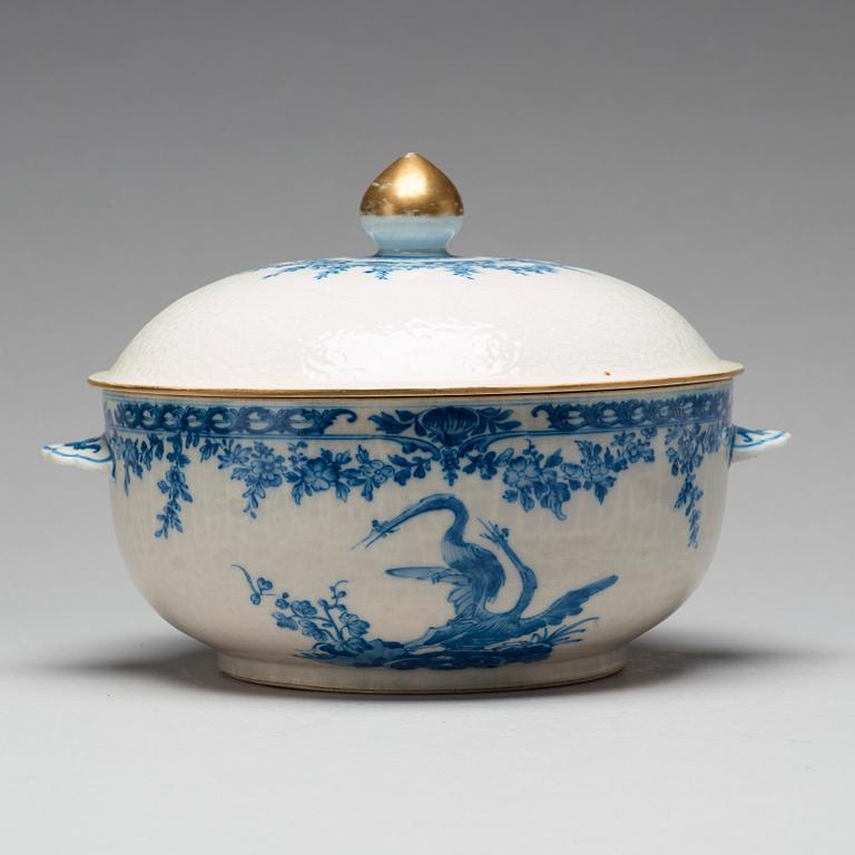 A blue and white armorial tureen with cover, and stand, Qing dynasty, 18th Century.