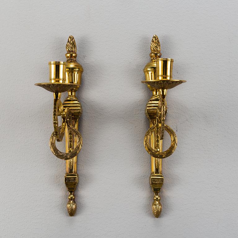A pair of brass 'Törne' wall sconce, Ikeas 18th century Swedish Furniture series.