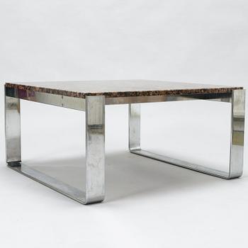 A chromed steel and polished granite coffee table, latter half of the 20th century.