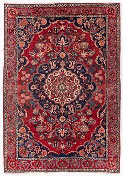 An Persian carpet, ca. 310 x 215 cm.