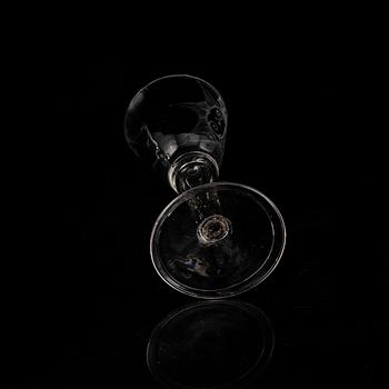 A wine glass with the monogram of the Swedish king Adolf Frederick, 18th Century.