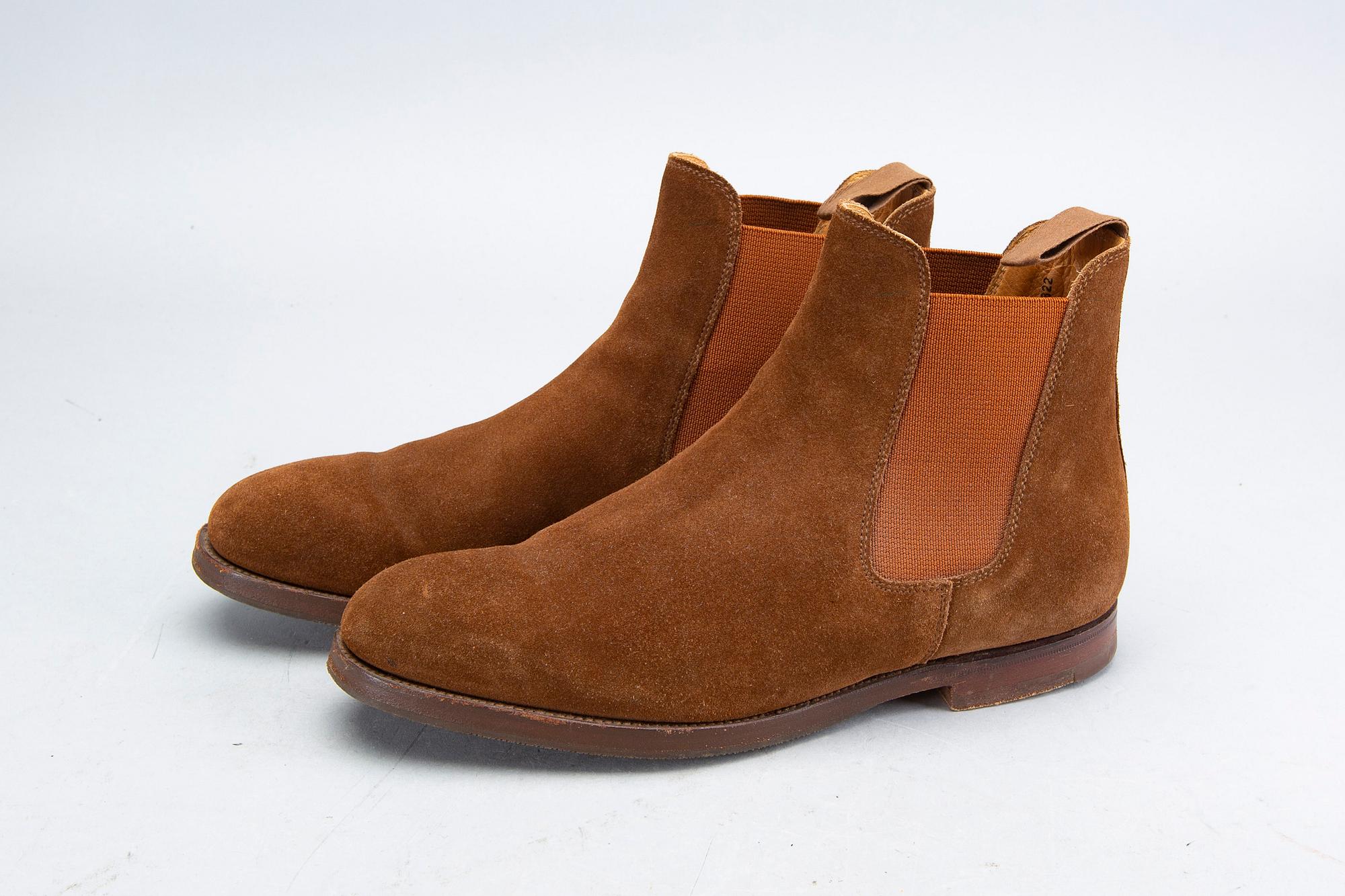 A pair of brown suede 'Gresham' Crockett & Jones boots.