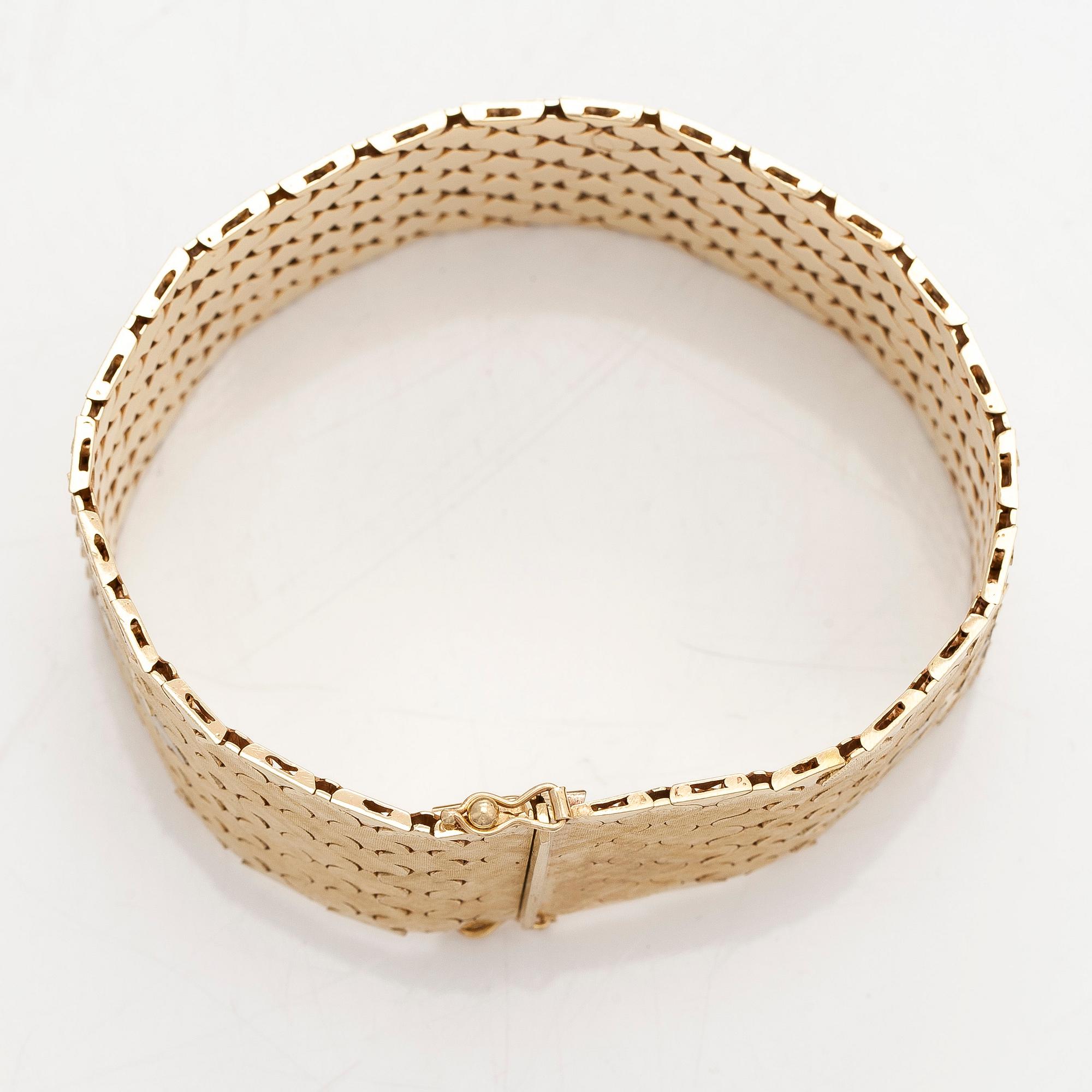 Armband i 14K trefärgsguld.