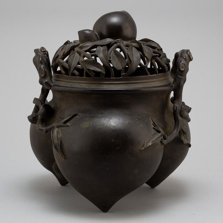 A Japanese bronze incense burner with cover, 20th century.