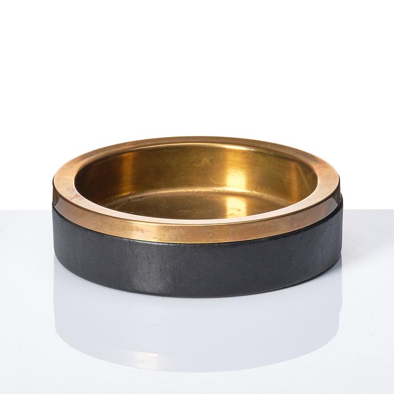 Alvar Aalto, a brass and leather ashtray, Valaistustyö, Finland.