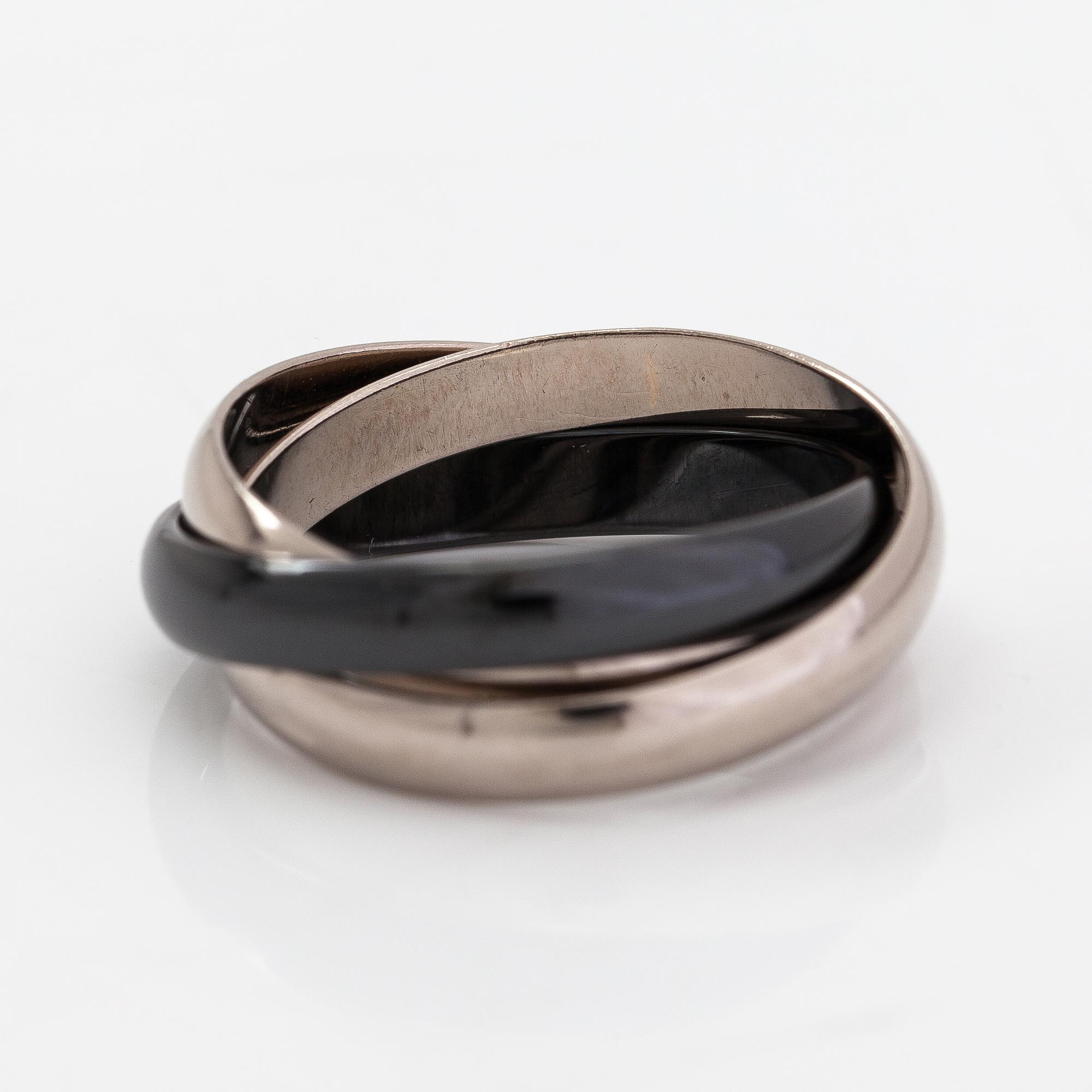 Cartier, An 18K white gold a ceramic ring "Trinity". Marked Cartier, JQV623.