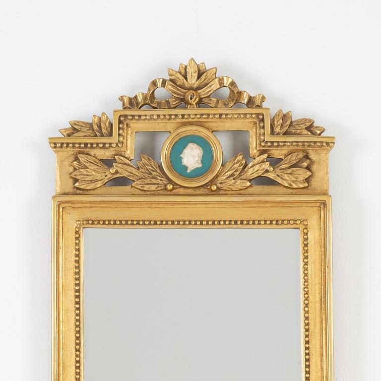 A Gustavian style mirror, mid 20th Century.