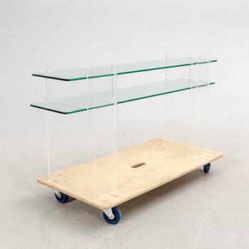 A late 20th century plexi and glass sideboard.