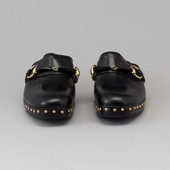CLOGS by Gucci, size 40.