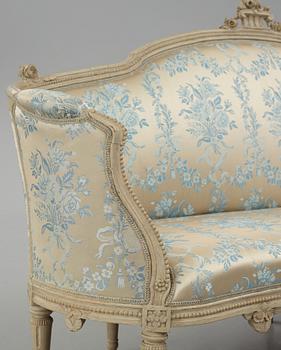 A grey-painted Gustavian 'canapé en corbeille'. sofa, by J E Höglander.