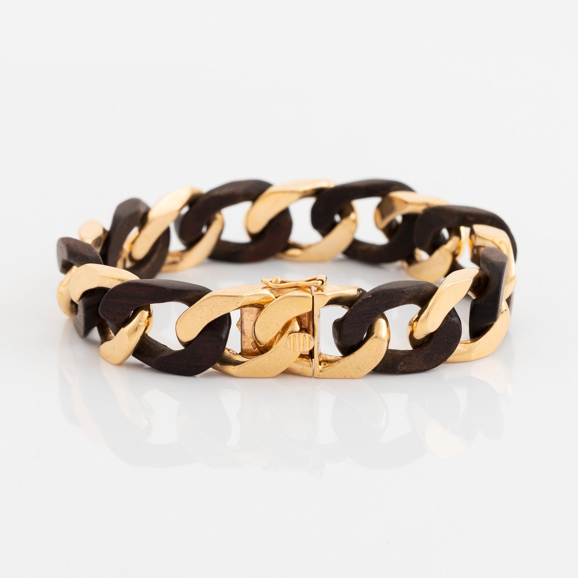 A Van Cleef & Arpels 18K gold and wood bracelet.