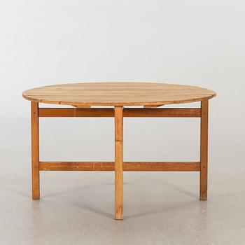 A circular garden table, probably Elsa Stackelberg for Fri Form.