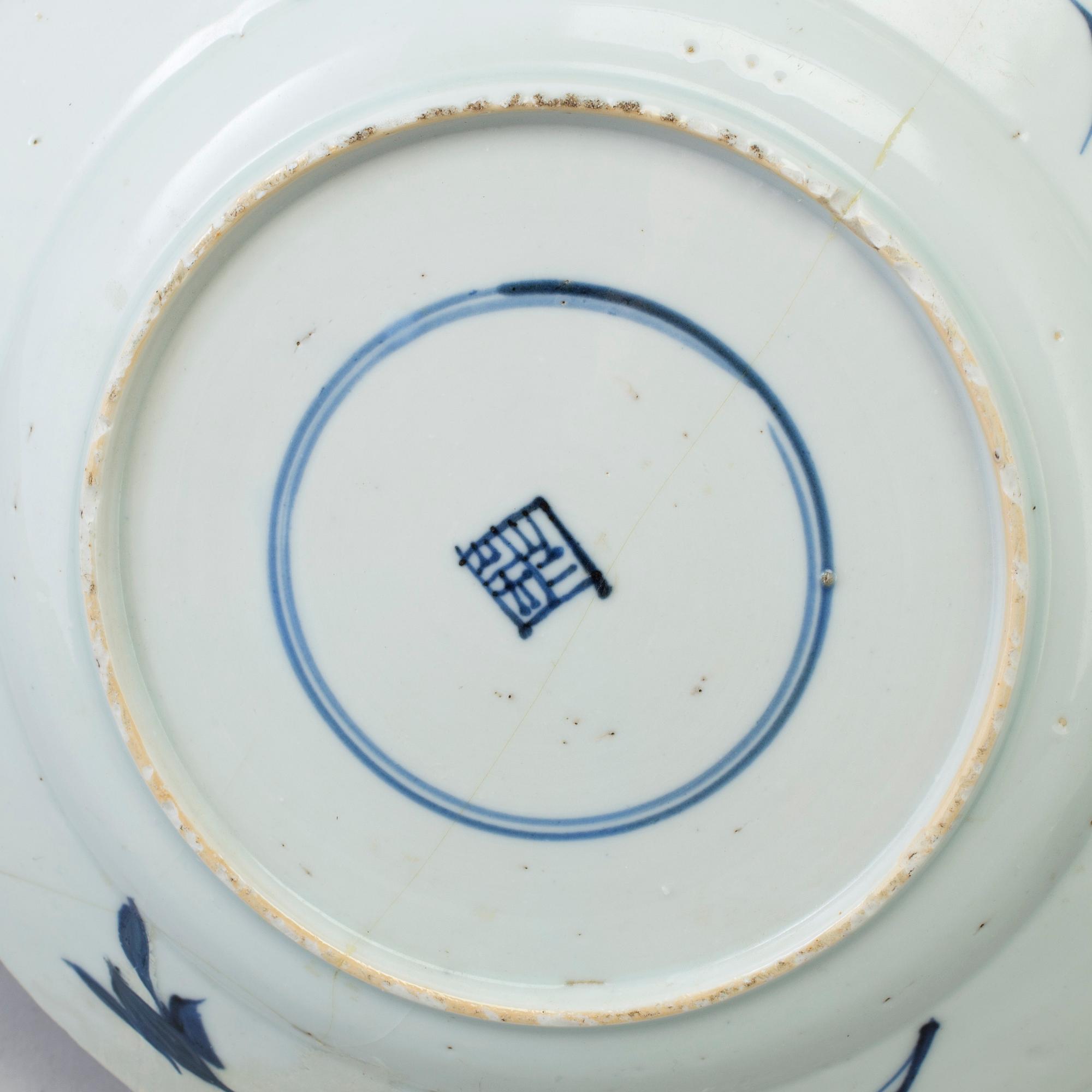 Four blue and white porcelain dishes, Qing dynasty, 18/19th century.