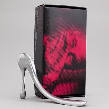 A Manolo Blahnik shoe horn, modern.