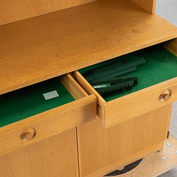 BERTIL FRIDHAGEN,BODAFORS. A set of three oak-veneered bookcases, later part of the 20th Century.