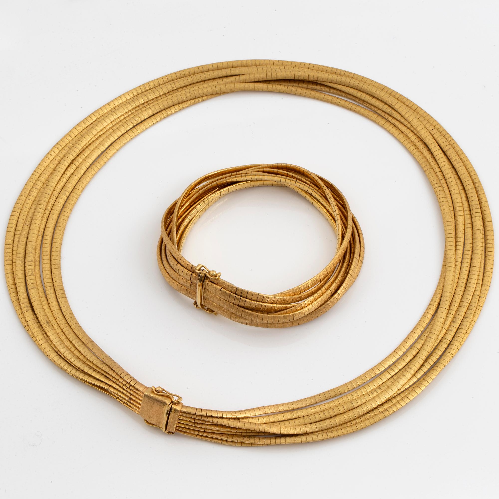 18K gold necklace and bracelet.