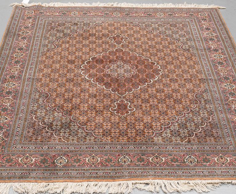 A RUG, Old Tabriz, part silk, ca 201 x 152 cm.