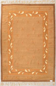 A 1920s Finnish flat weave carpet probably for Kotiteollisuus Oy Orkamo. Circa 340x245 cm.
