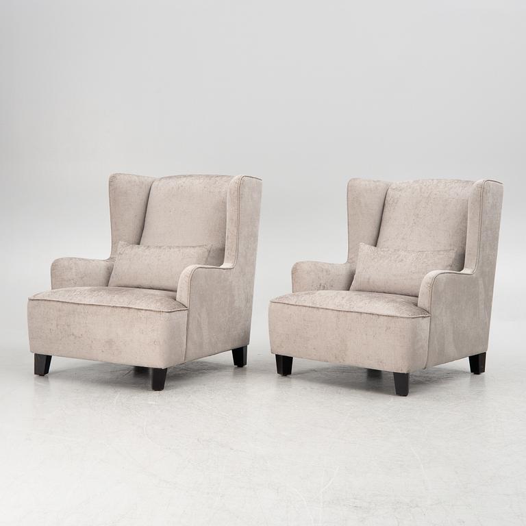 A pair of easy chairs, 21st century.